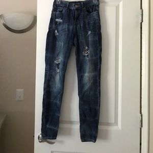 Distressed high rise dark blue jeans