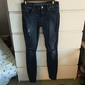 dark wash ripped skinny jeans