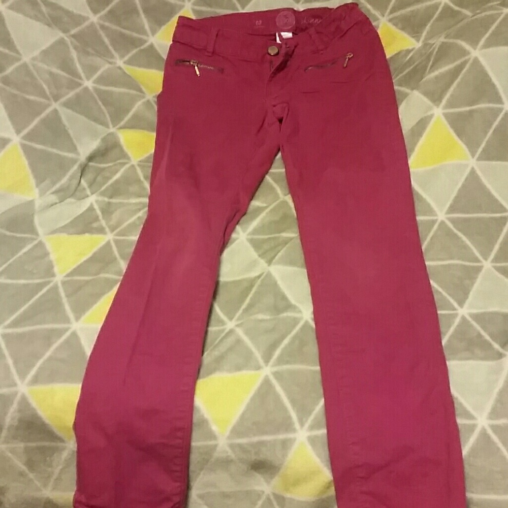 Purple skinny jeans with zipper pockets