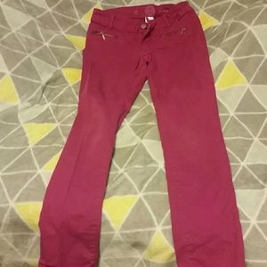 Purple skinny jeans with zipper pockets