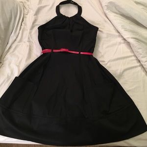 Black halter dress with red belt