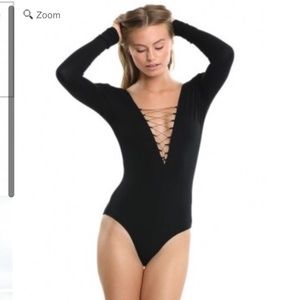 Kittenish Lace Up Body Suit