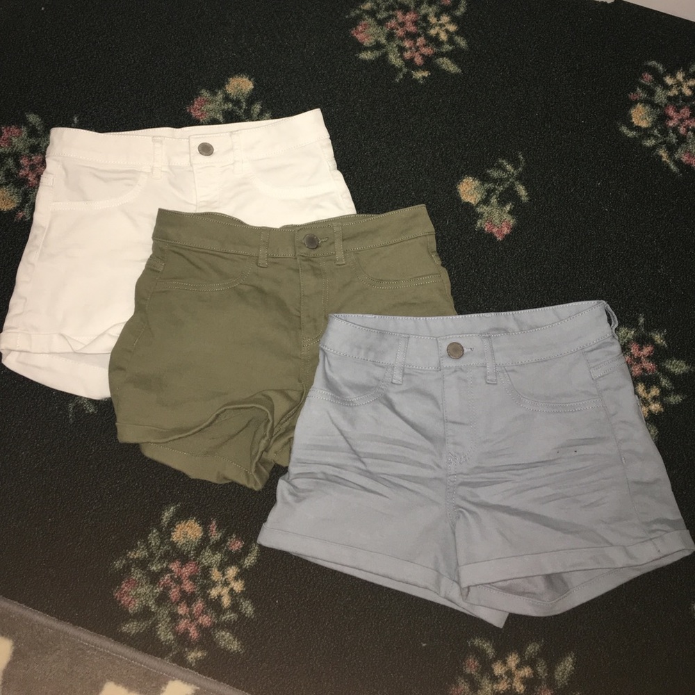 White, army green, light blue shorts.