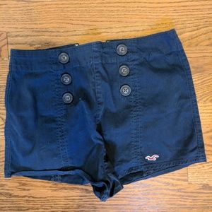 Navy, high waisted shorts with accent buttons!