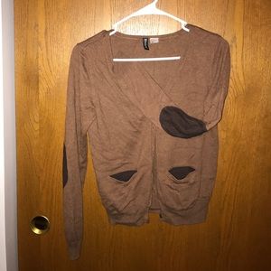 Brown cardigan sweater.