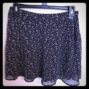 Black skirt with colorful floral print