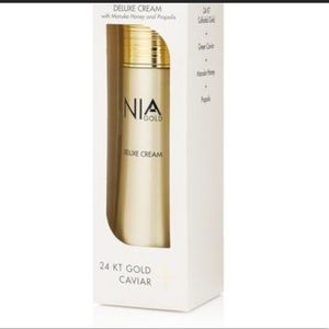 NWOT NIA gold Deluxe Cream (new in box)