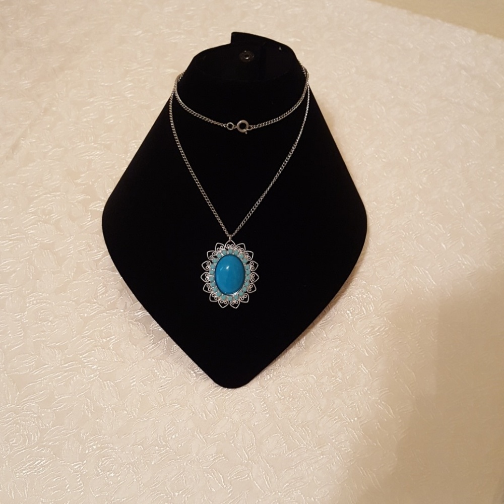 Turquoise and silvertone necklace. 24 inches long