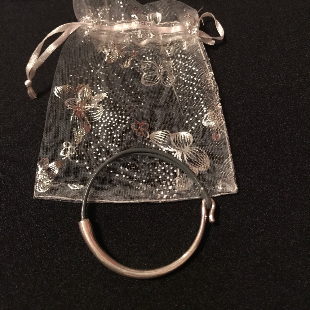 Silver and leather bracelet