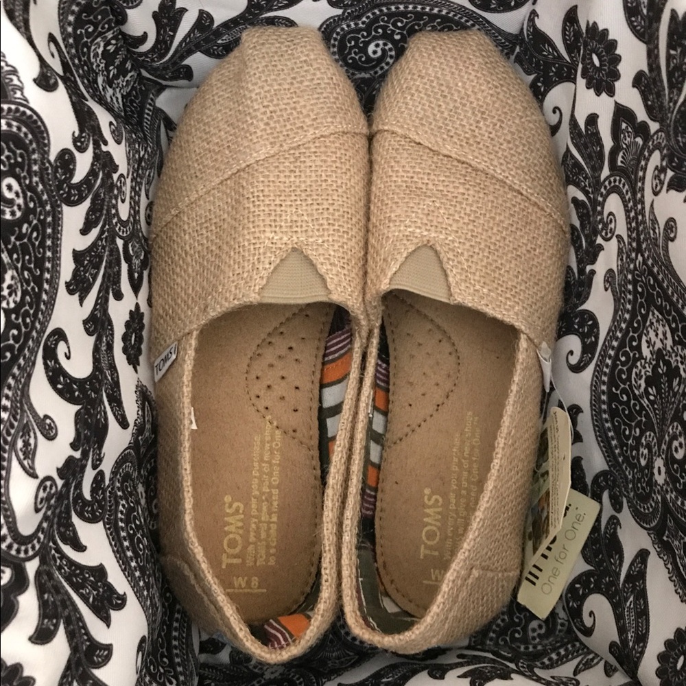 NWT Beige Toms, never warn, feel like size 7