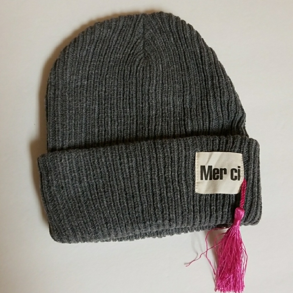 Gray beanie  with pink tassel