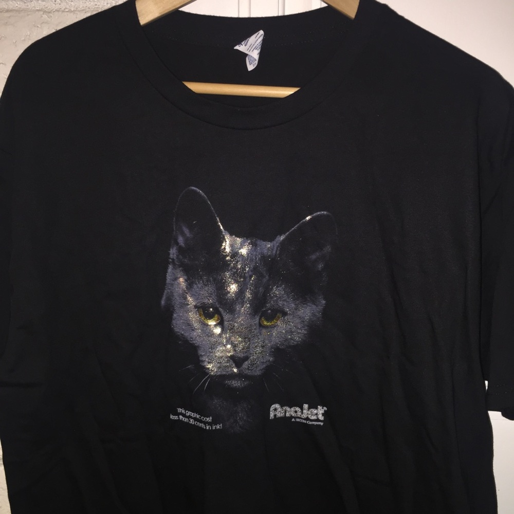 Gold cat black shirt
