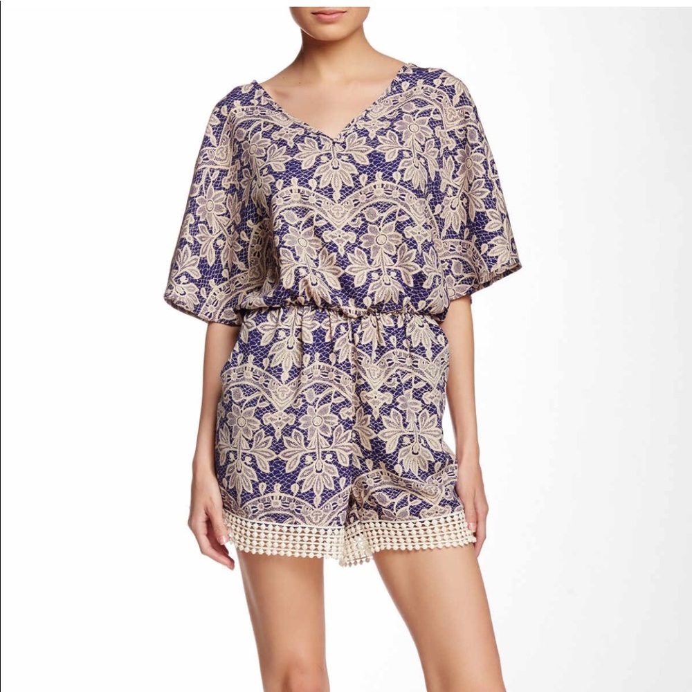 Crochet hem romper.