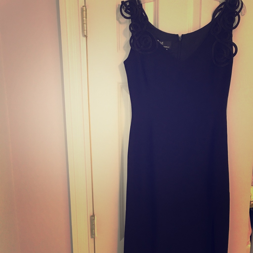 Black floor-length gown w/ slit & shoulder detail