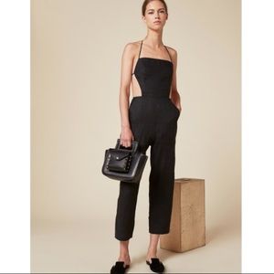 NWOT backless halter jumpsuit
