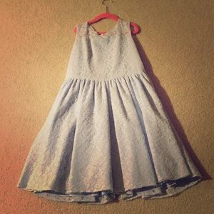 A light blue formal dress.