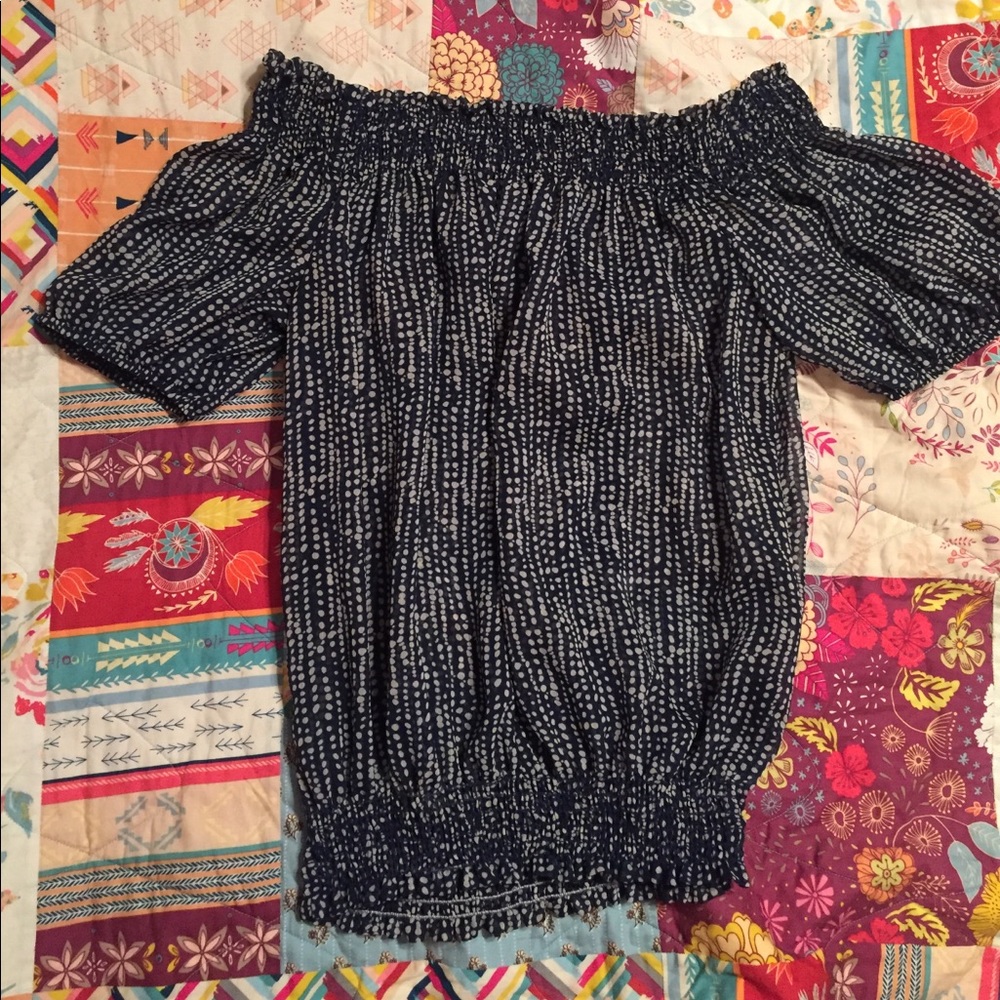 Off the shoulder shirt.