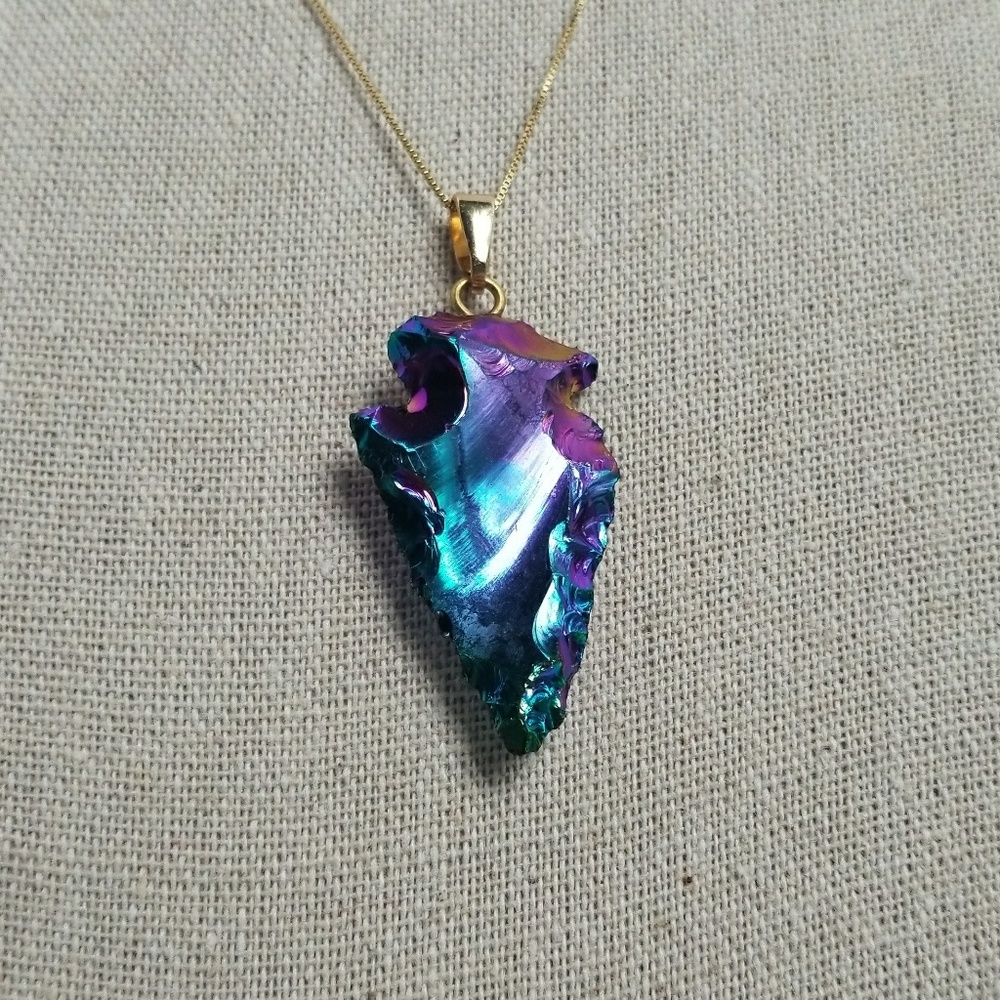 Anodized Rainbow Arrowhead pendant necklace.