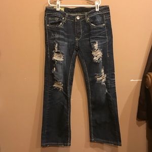 Crop ripped machine jeans