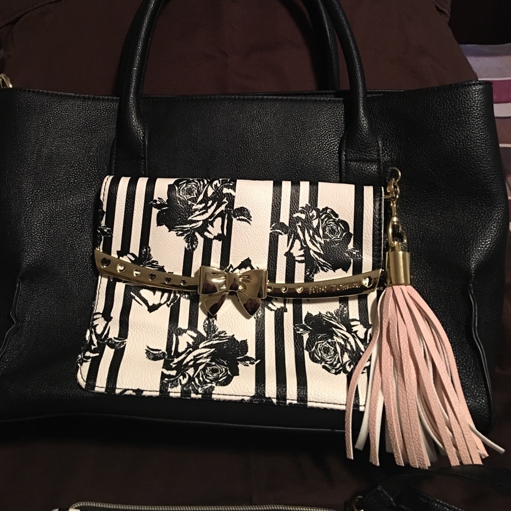Betsey Johnson bag. makeup bag included.