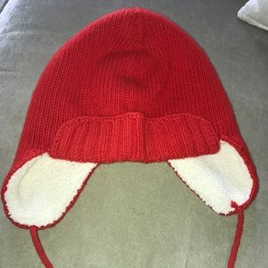 Red shearling-lined toboggan hat