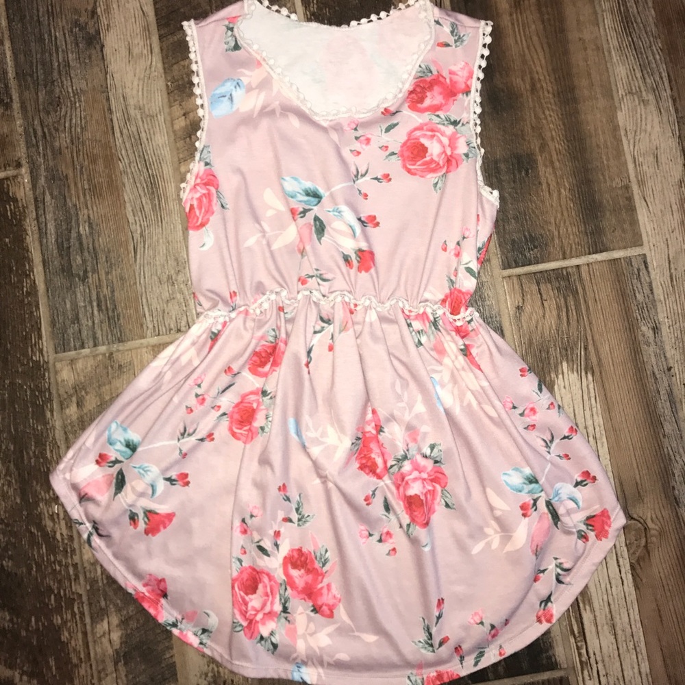 Floral sleeveless semi peplum tank