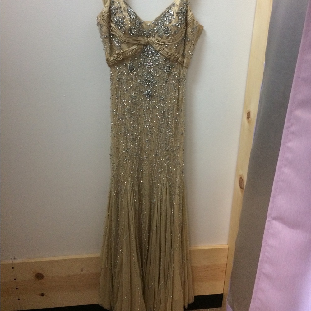 Dolce jovani Gold dress