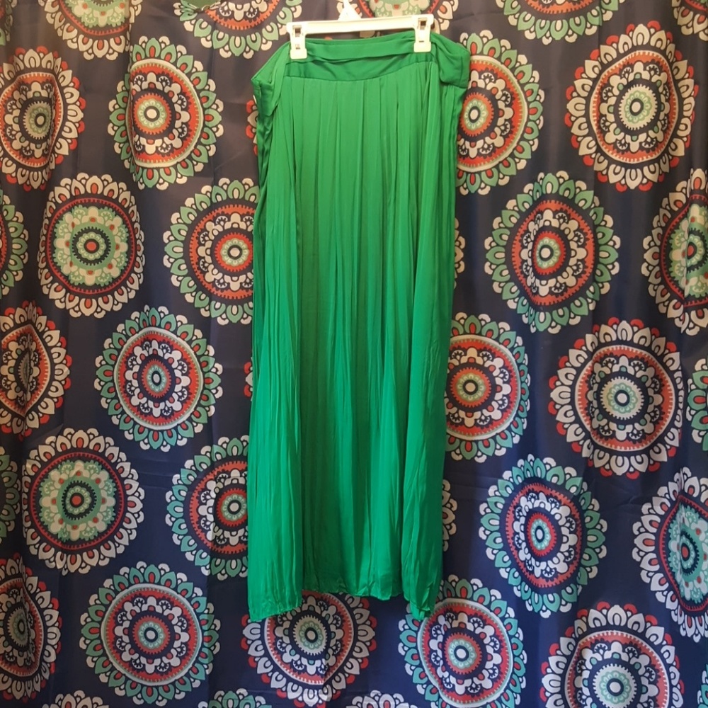 Long green pleated skirt
