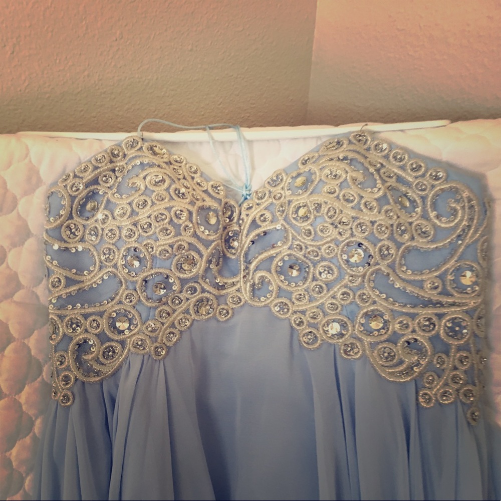 Dress baby blue wth sequence almost knee length !