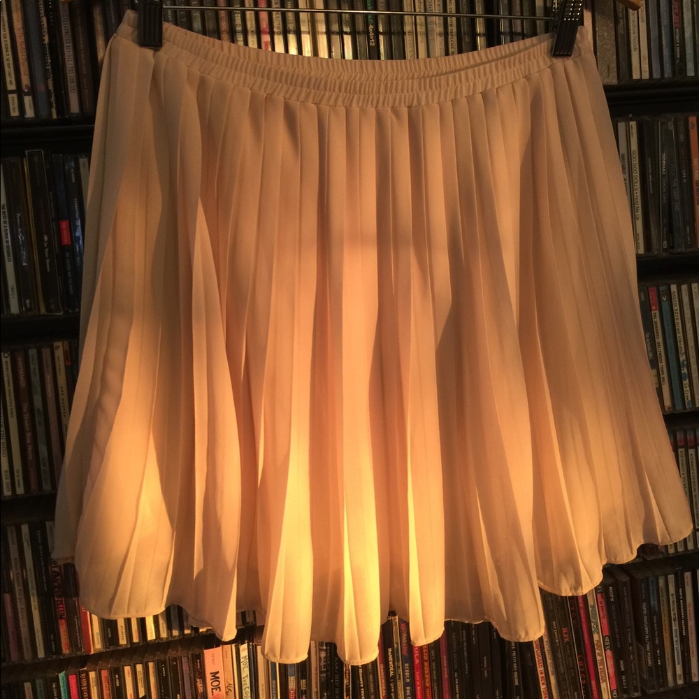 Cream/Ivory twirly skirt, size medium