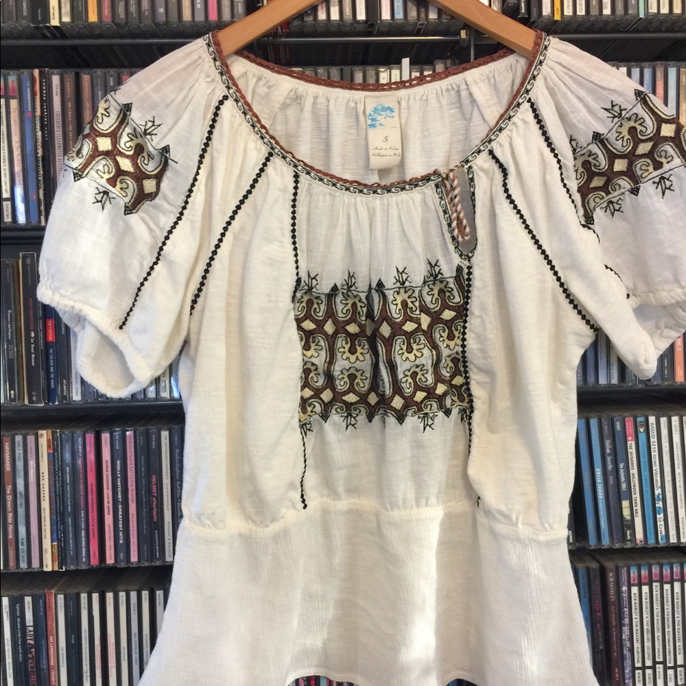 Embroidered peplum top, size small