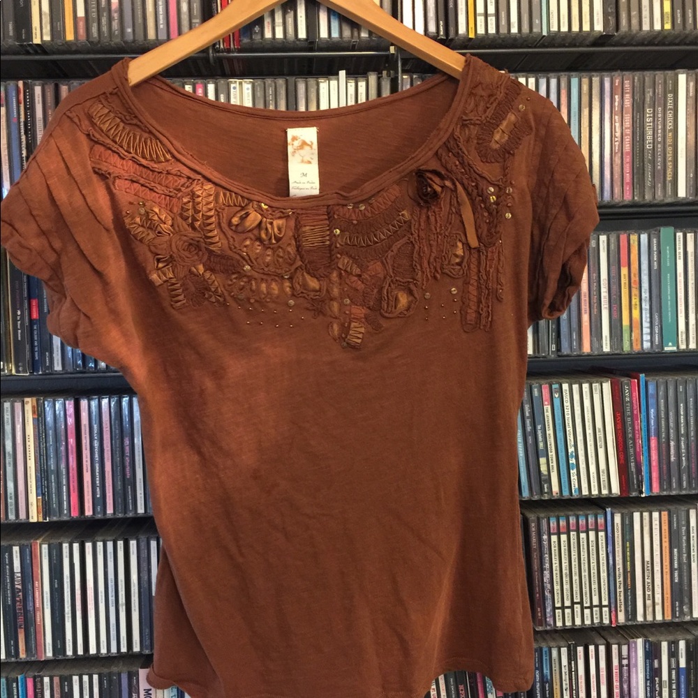 Brown detail topped top