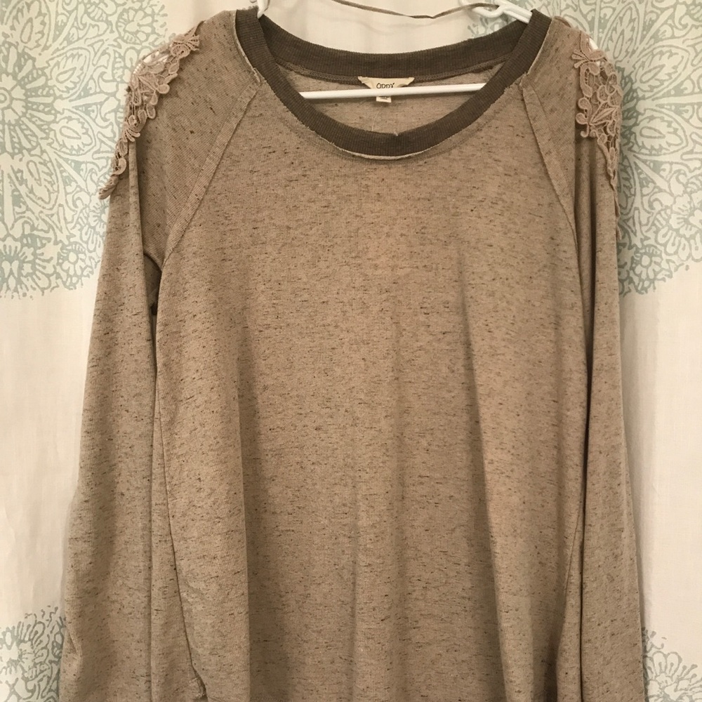 Brown & tan sweater with crochet detail.