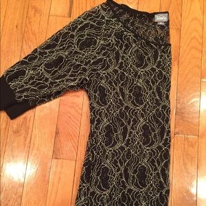 Vanity shirt size medium.