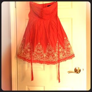 Beautiful strapless coral dress.