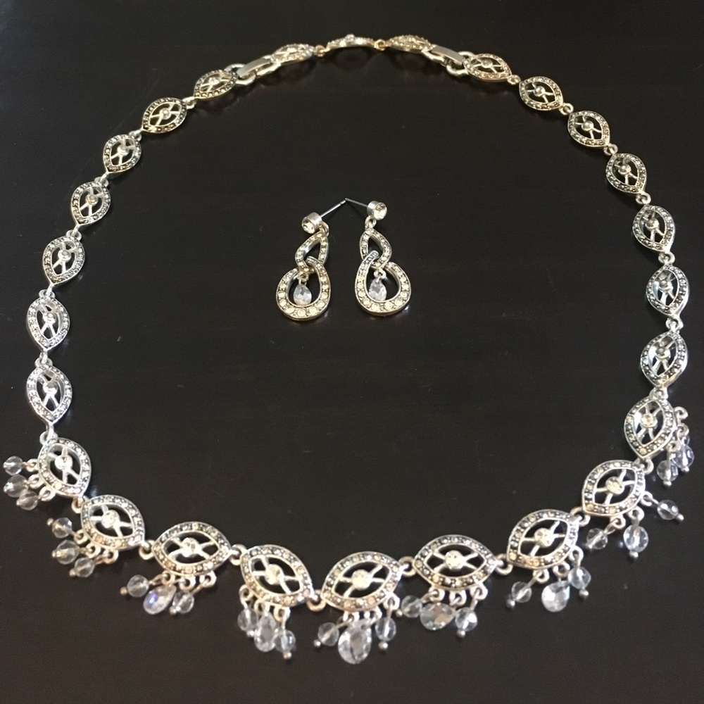 Silver necklace and earring set