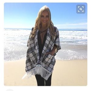 Black and white ponch with hoodie