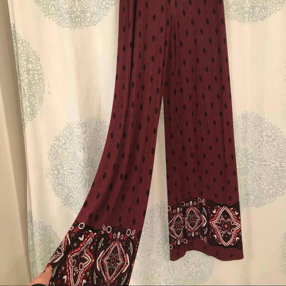 Red, black & white patterned pants.