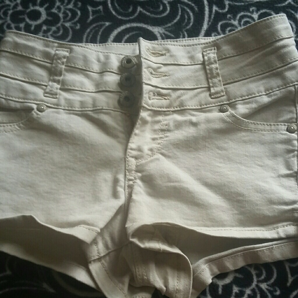 Blue Spice high-waisted shorts.