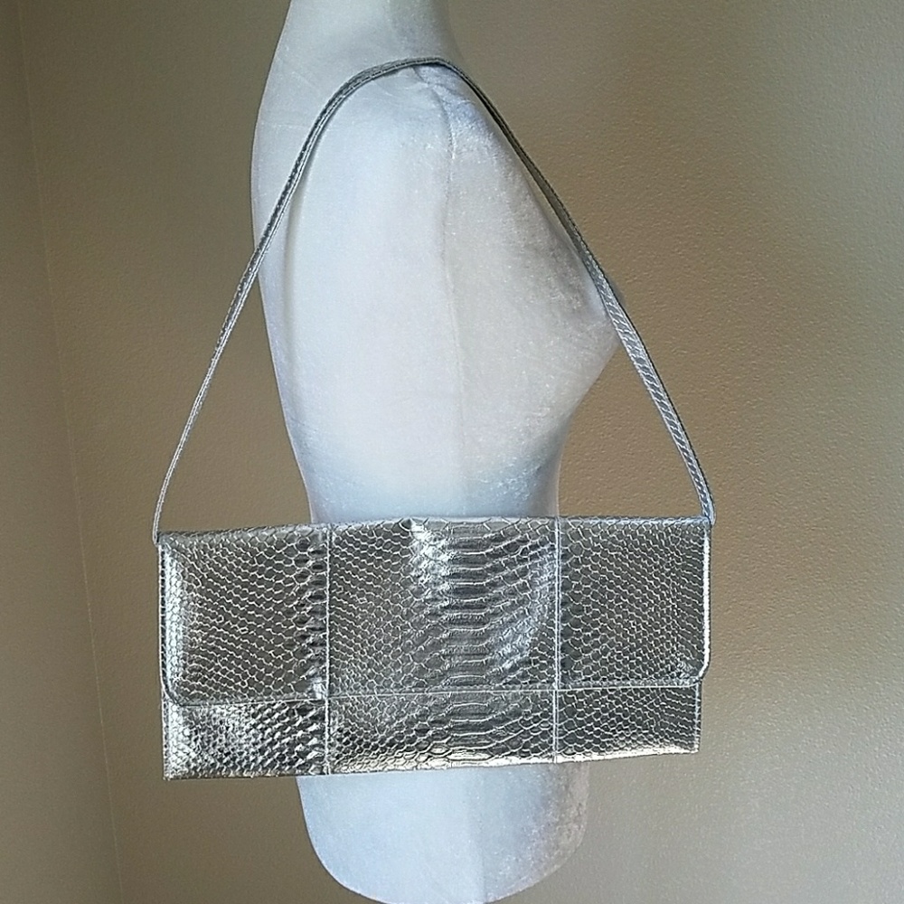 miztique silver clutch