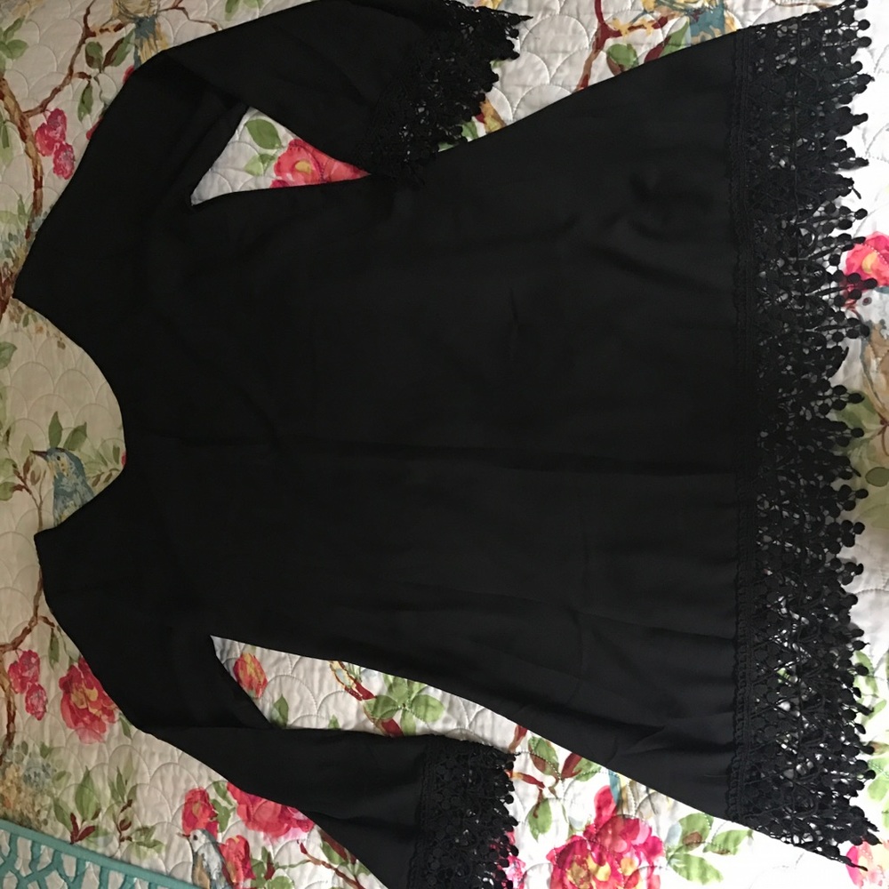 Black long sleeved dress.