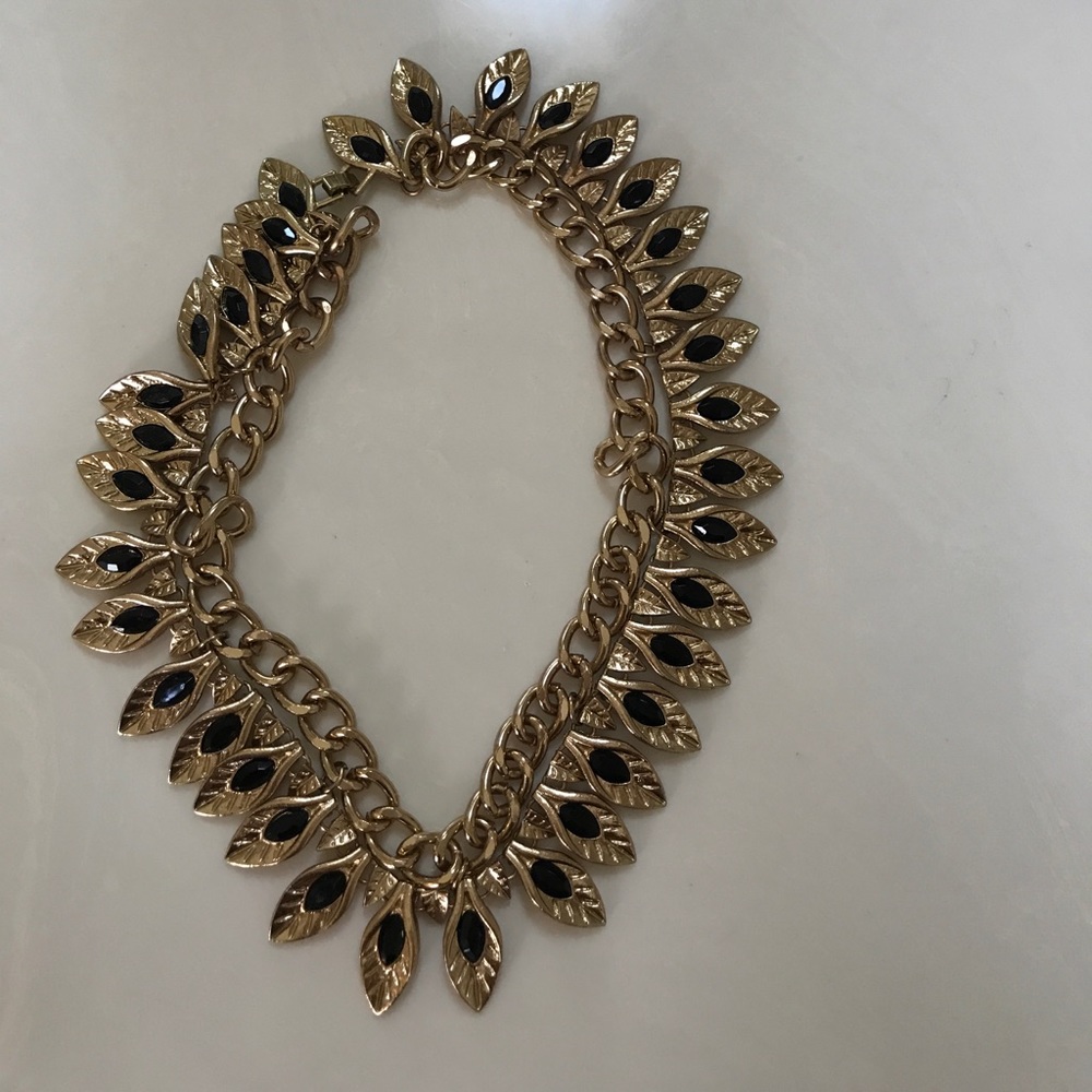 Apostrophé black and gold necklace.