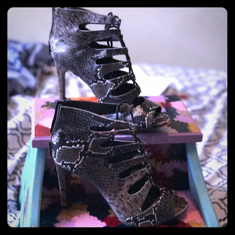 Atmosphere lace up snake skin pumps