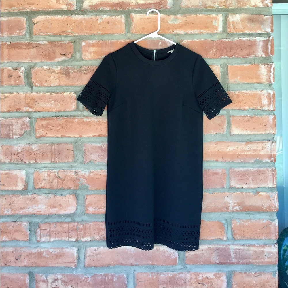 Black shift dress with cutouts