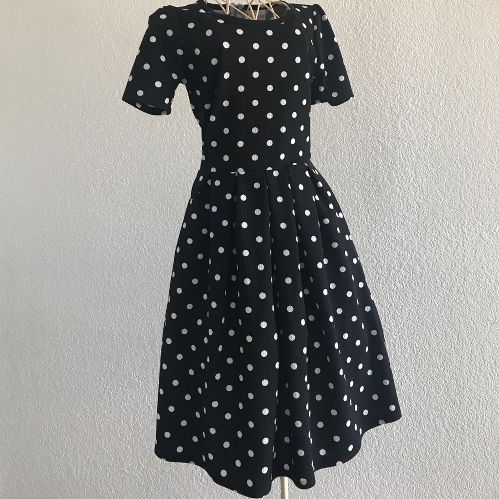 Women's lularoe white polka dot Amelia dress.