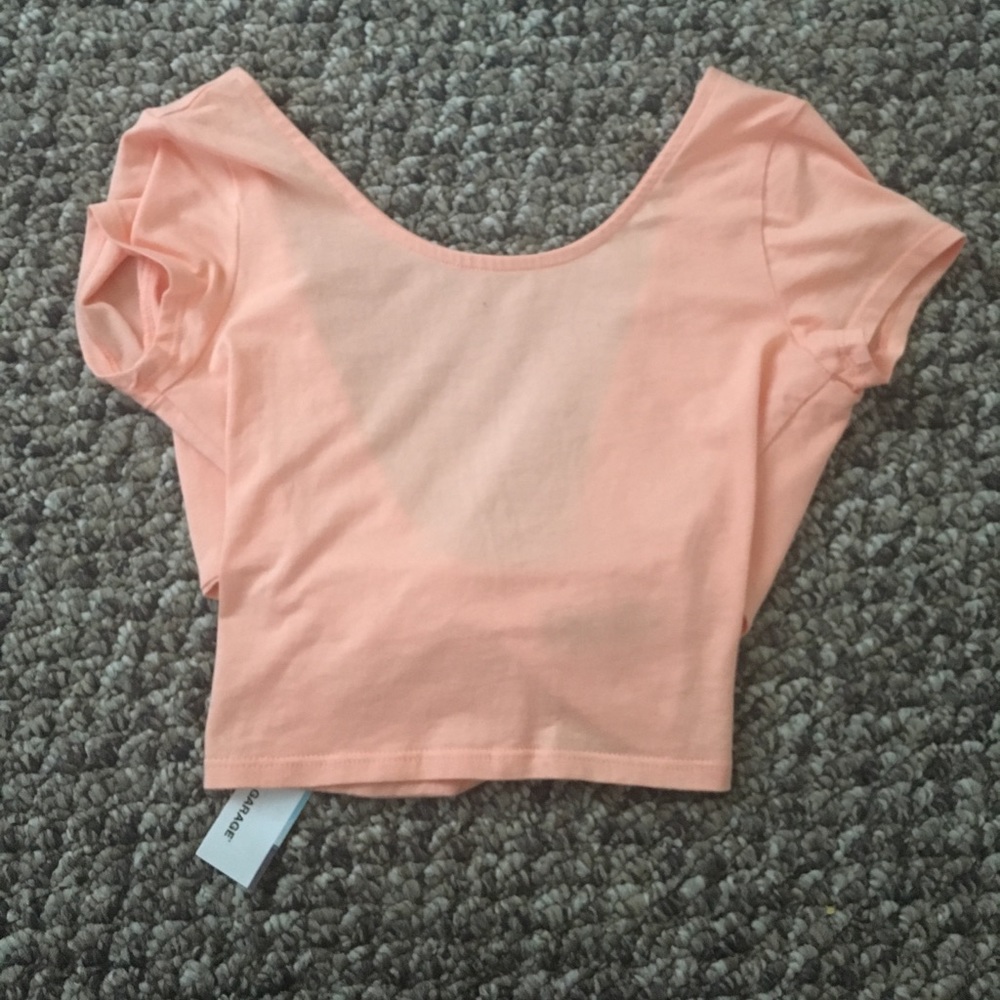 A peach crop top brand new from Garage