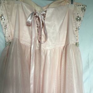 Masquerade soft pink ball gown