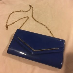 Never worn! Blue crossbody clutch!!