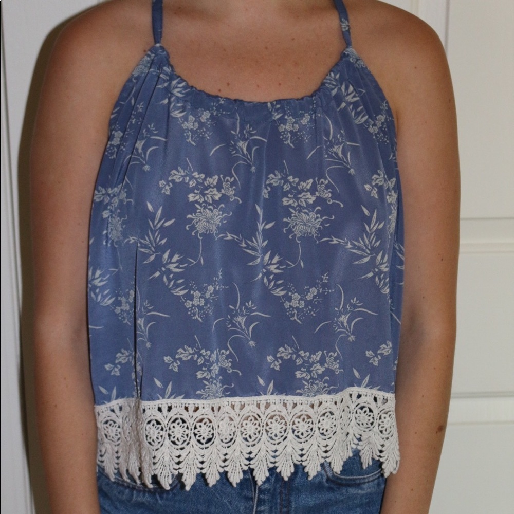 Blue halter tank with flowers and detailed bottom