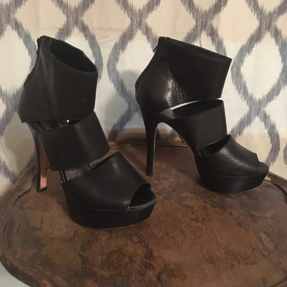 Bebe black heels with zipper in the back